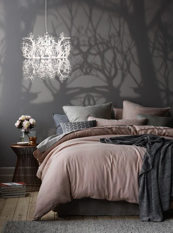 Chandelier casting branch shadows